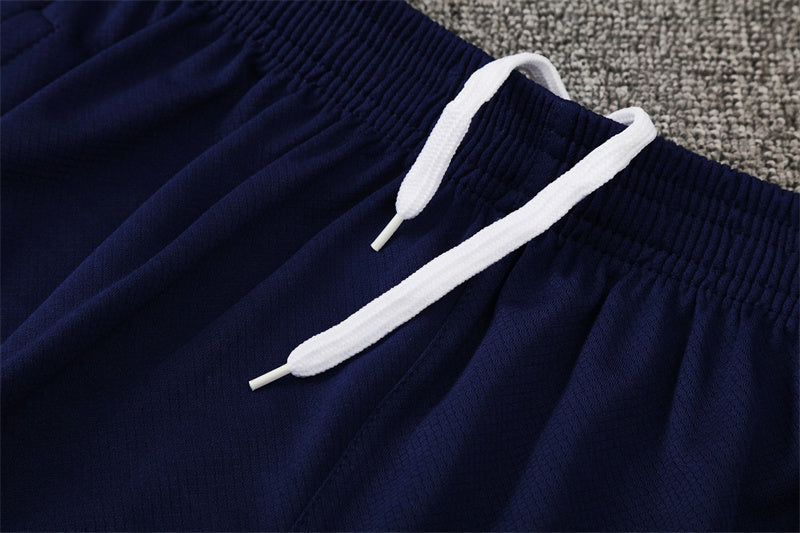 Training kit Barcelona T90 orange 25/26